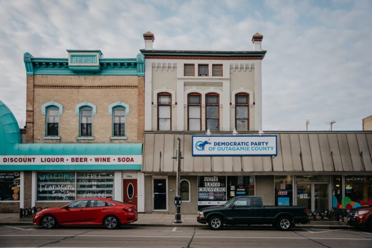 Cars are parked in front of the Democratic Party of Outagamie County office