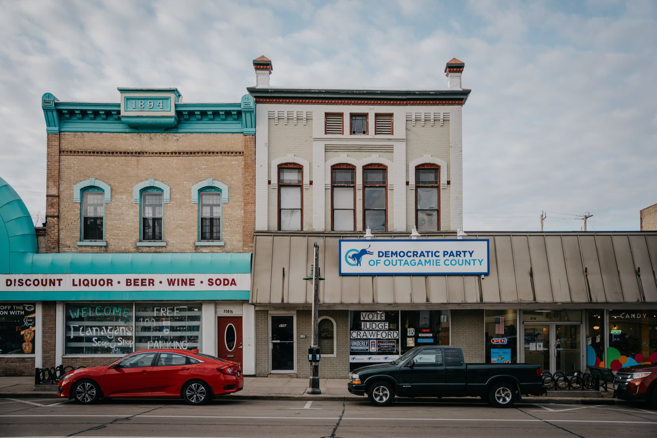 Cars are parked in front of the Democratic Party of Outagamie County office