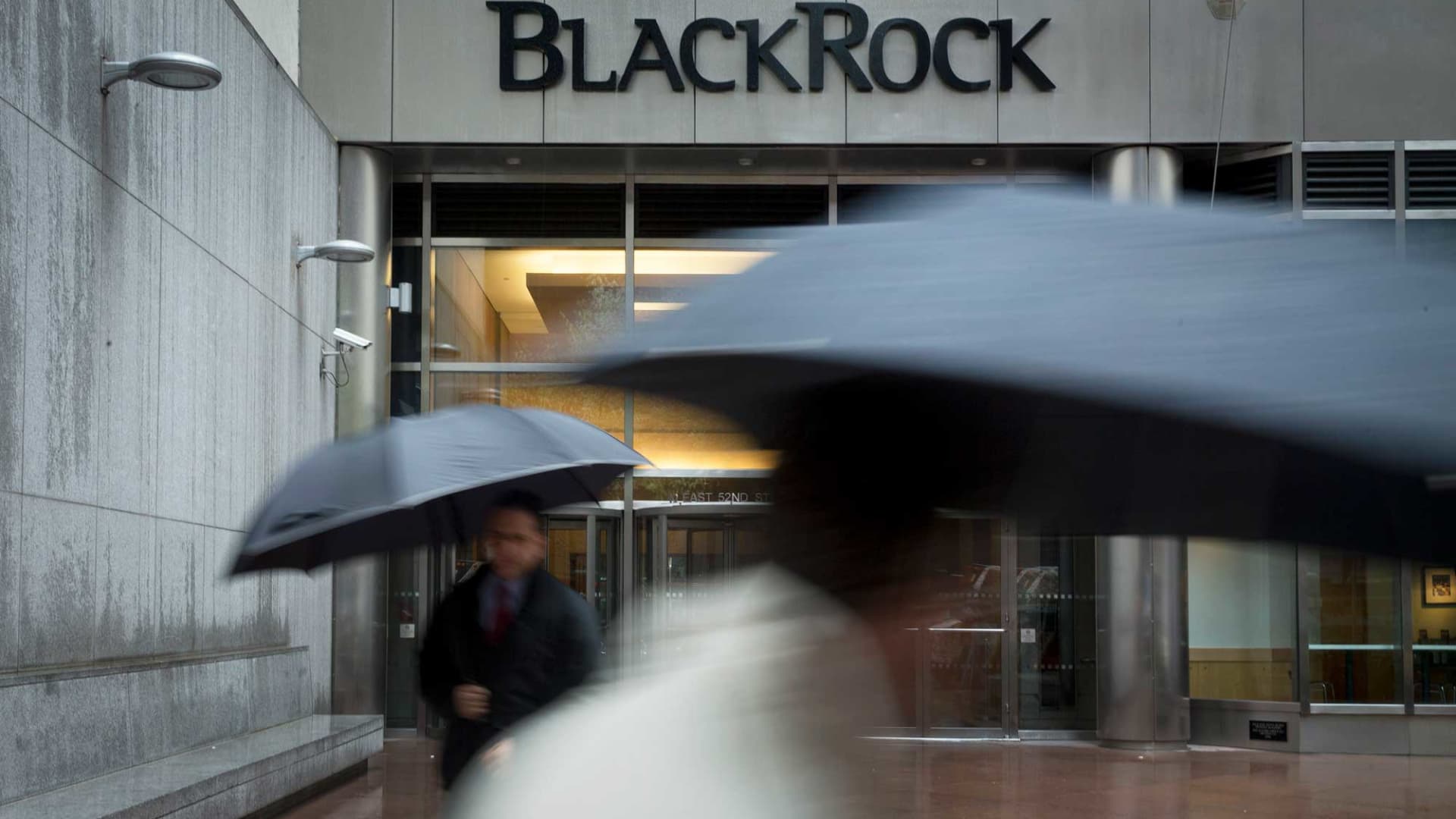 We're lowering our price target on a financial stock, but a valuation premium is still warranted