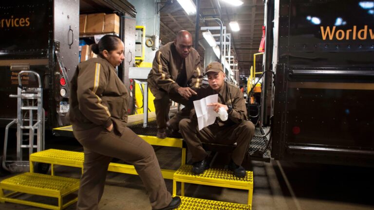 UPS profit beats estimates, to cut 20,000 jobs on economic worries