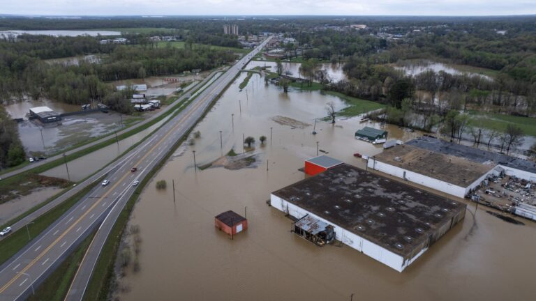 Millions across Midwest and South reeling from widespread flooding as storm death toll rises to 21