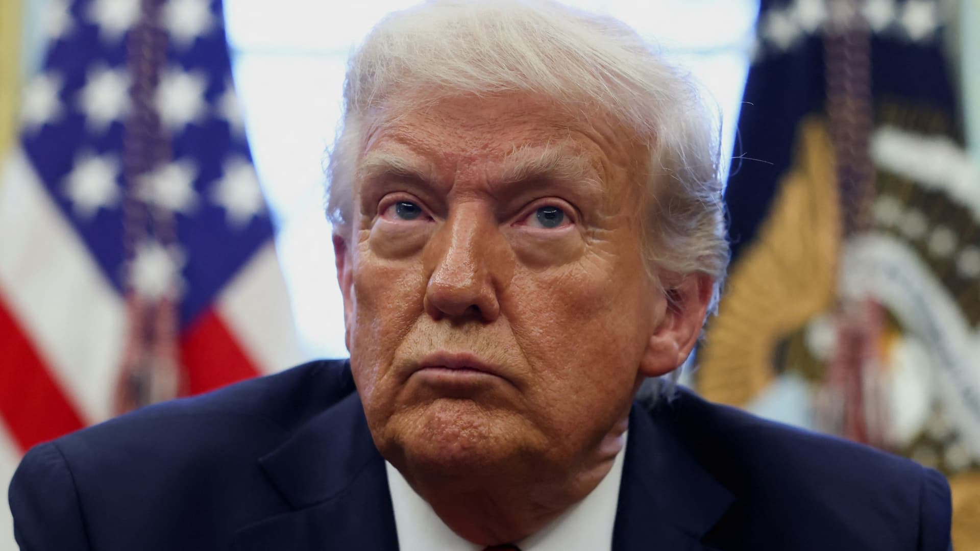 Trump says government to change service regulations for career government employees