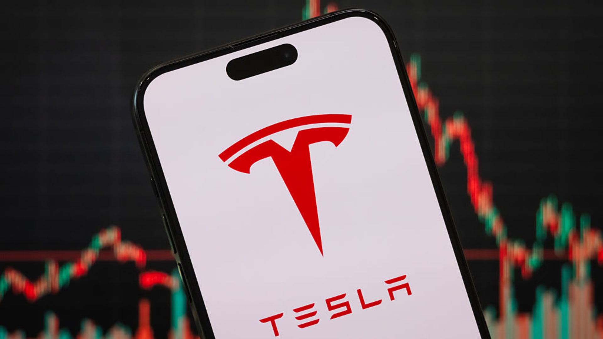 Tesla gets a slew of price target cuts after big earnings miss