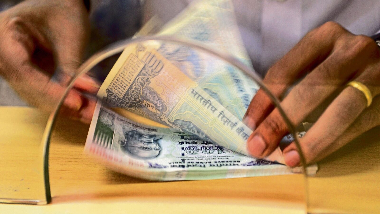 Rupee volatility can slash earnings by 250 bps in FY26, says Crisil; these sectors will be worst hit