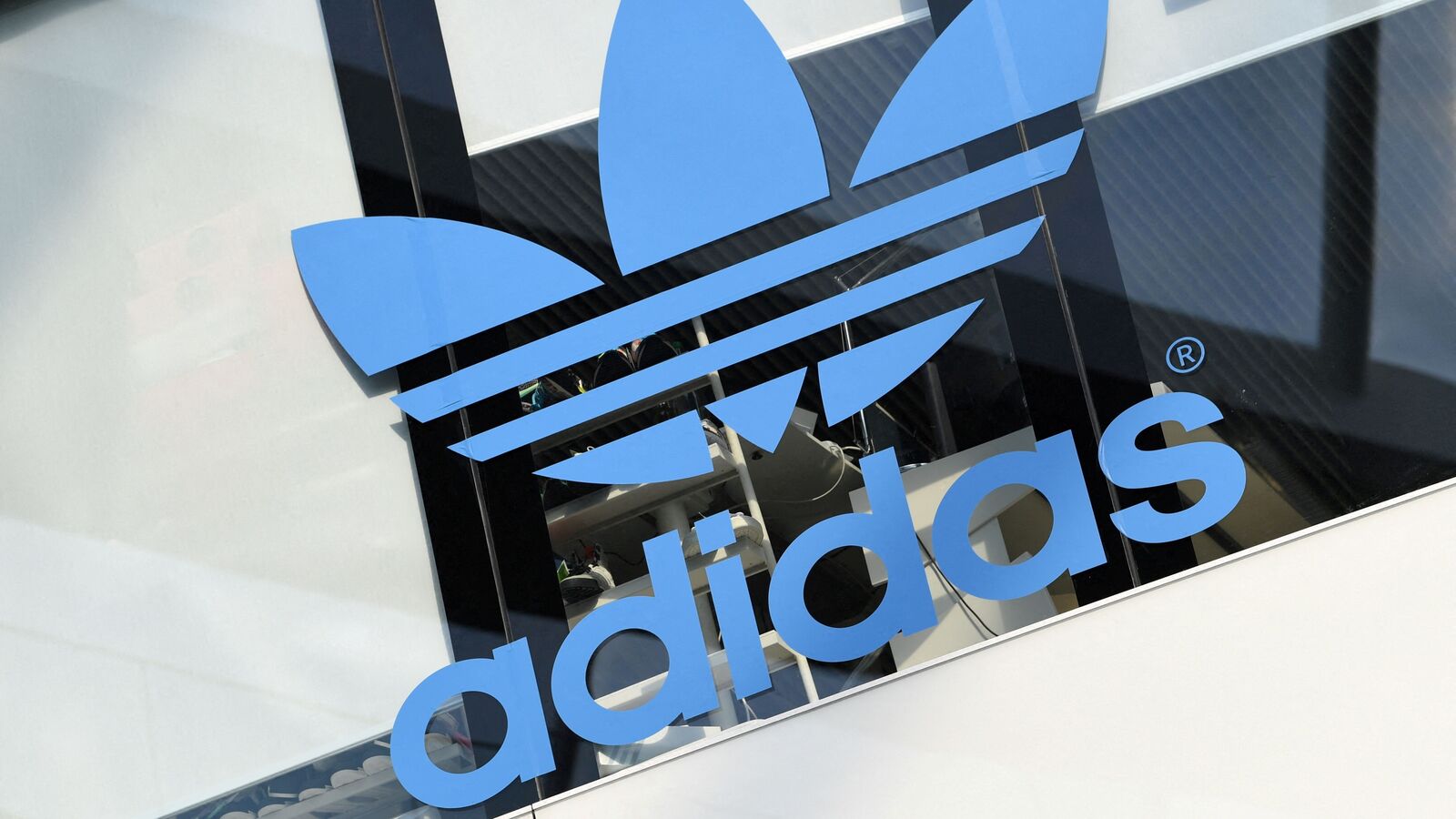 Adidas freezes 2025 profit guidance amid Trump tariff-induced inflation risk; stock down 12% YTD