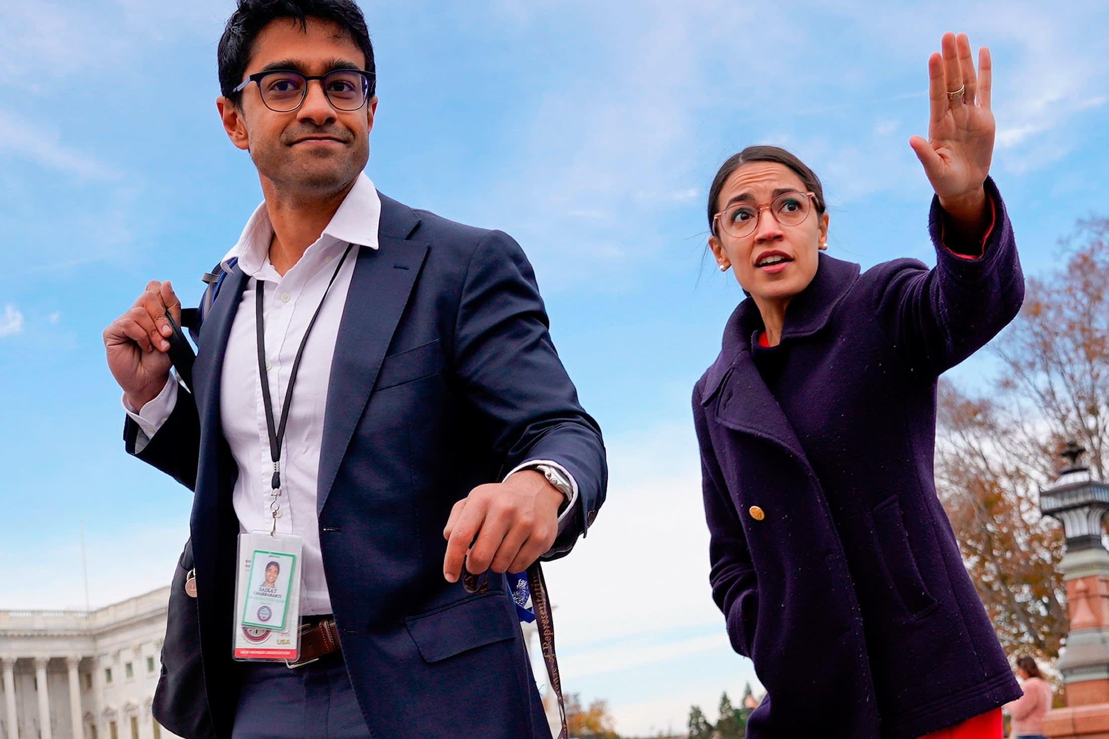 Saikat Chakrabarti and Alexandria Ocasio-Cortez wave in Washington