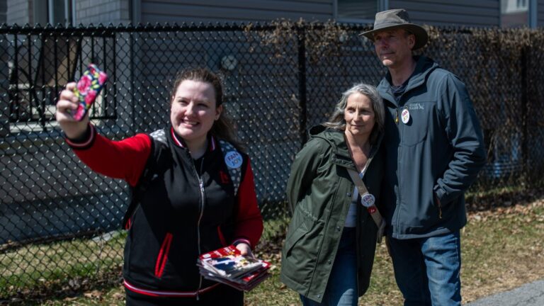 Kayley Kennedy, left, takes a selfie with fellow Liberal Party of Canada volunteers for Bruce Fanjoy’s campaign, June Neske, centre, and Bob Neske