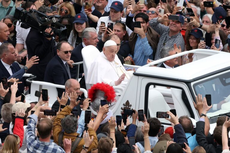 Pope Francis tours St Peter’s Square on the popemobile at the end of the Holy Mass on Sunday