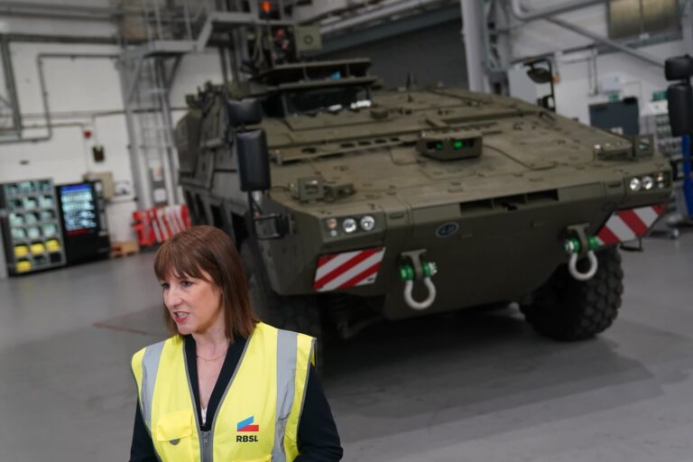 UK chancellor Rachel Reeves in front of a military tank at Rheinmetall BAE Systems Land in Telford, England on March 24 2025