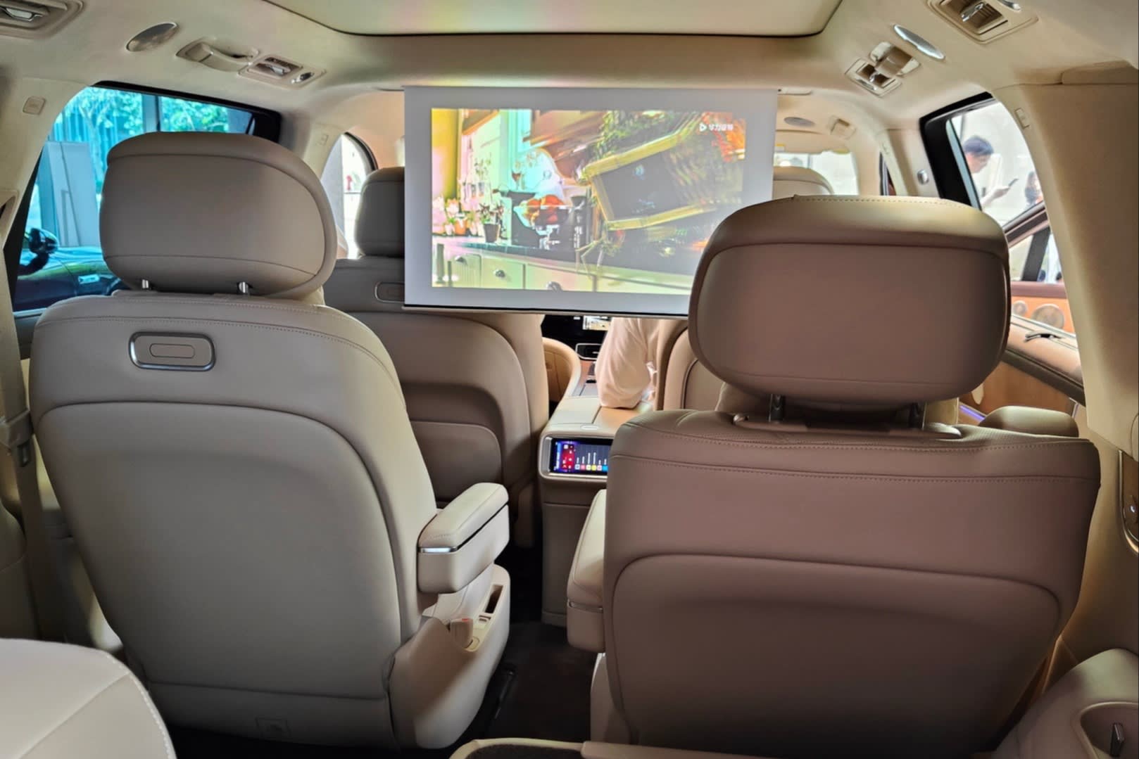 The interior of Huawei-backed Aito’s M9 SUV, showing pale-coloured seats and a big screen