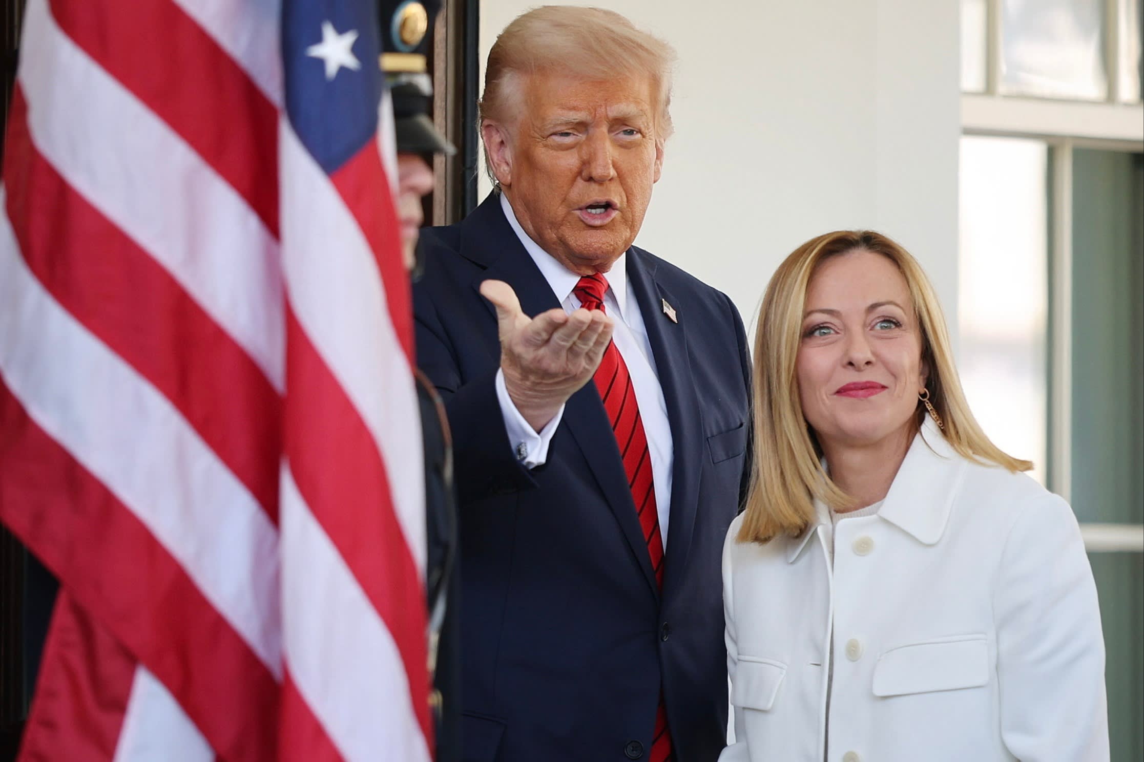 President Donald Trump greets Italian Prime Minister Giorgia Meloni