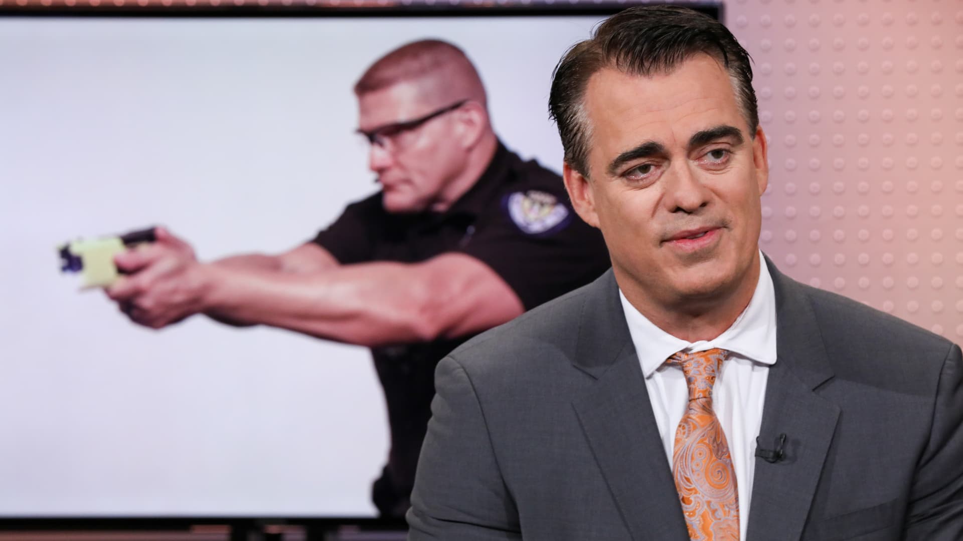 This law enforcement stock is forming a 'bull flag' pattern that signals more gains ahead, charts show