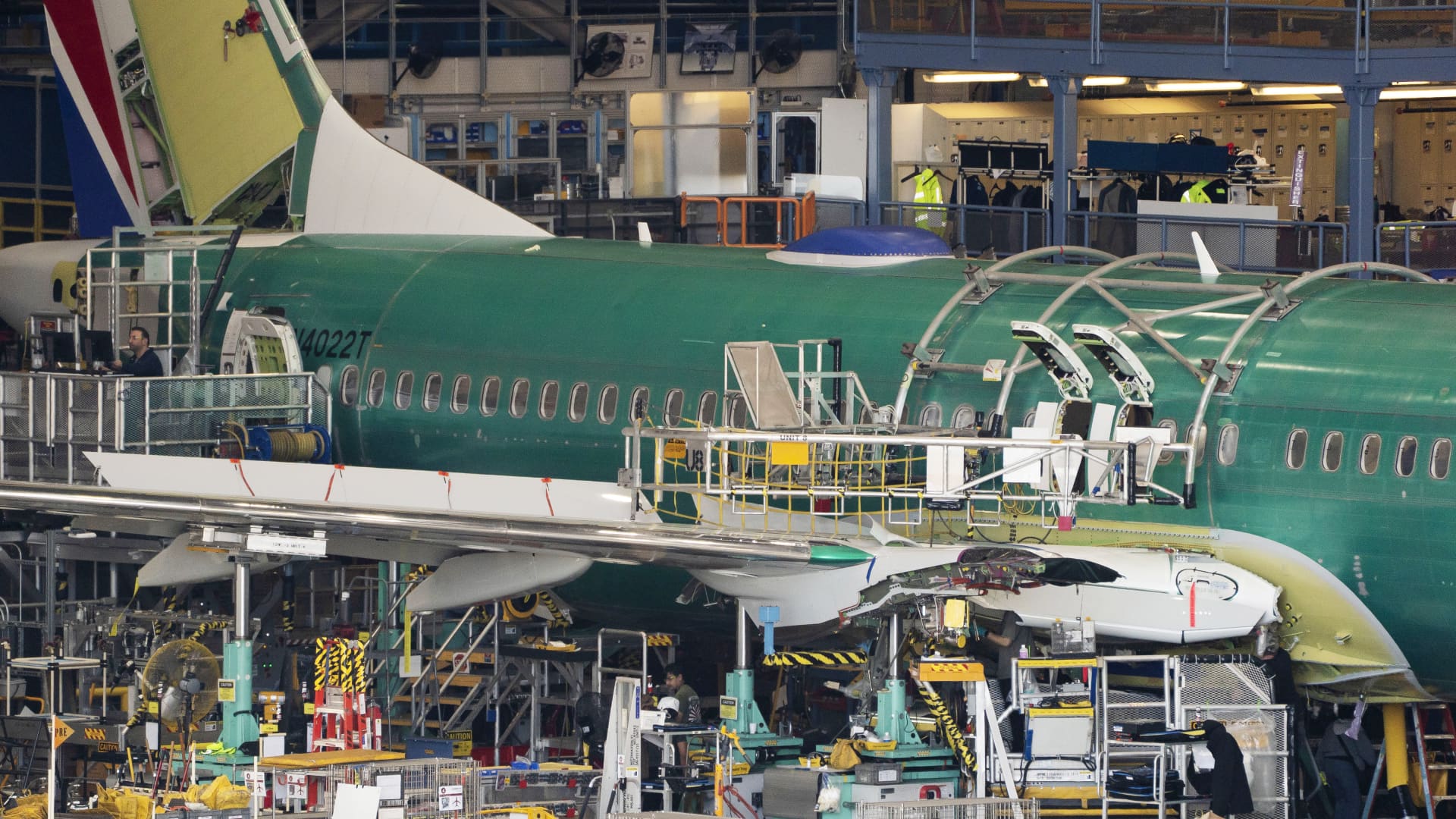 Boeing to resume airplane deliveries to China next month, ramp up Max production, CEO says