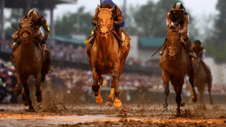 Sovereignty rules muddy track to win Kentucky Derby in a thrilling fight to the finish line