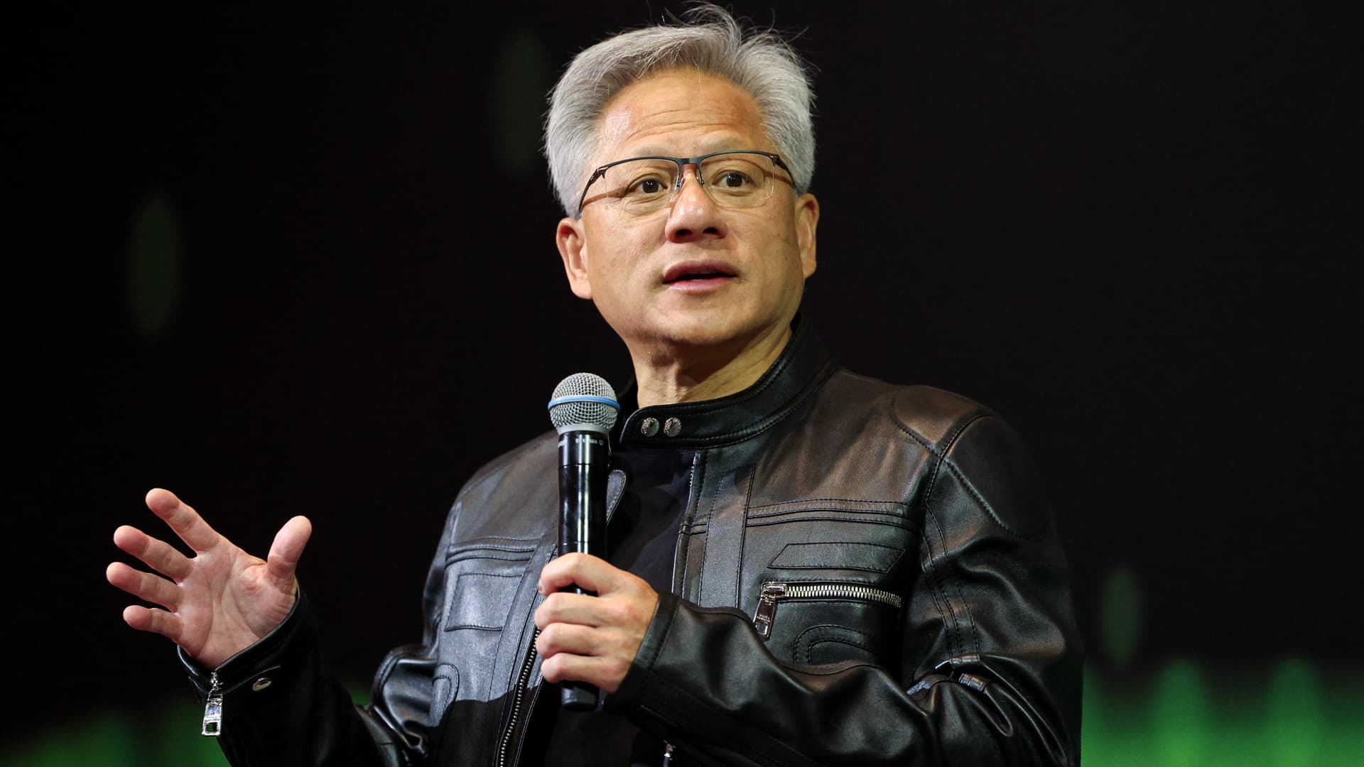 Jensen Huang says U.S. chip restrictions have cut Nvidia's China market share nearly in half