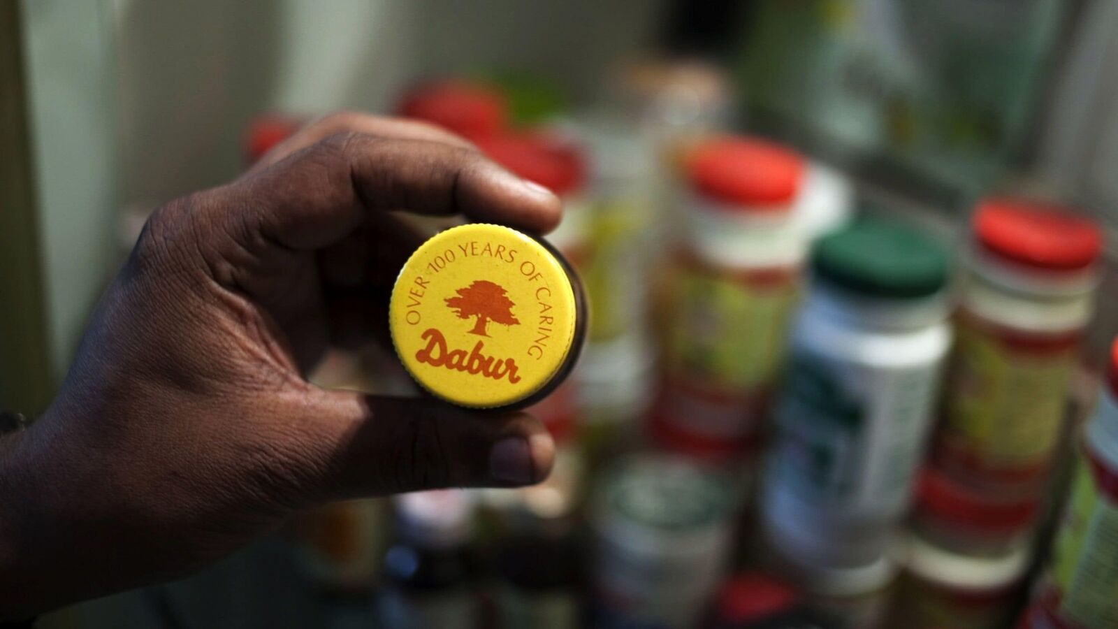 Dabur share price falls over 4% after Q4 results 2025, dividend. Should you buy or sell? | Stock Market News