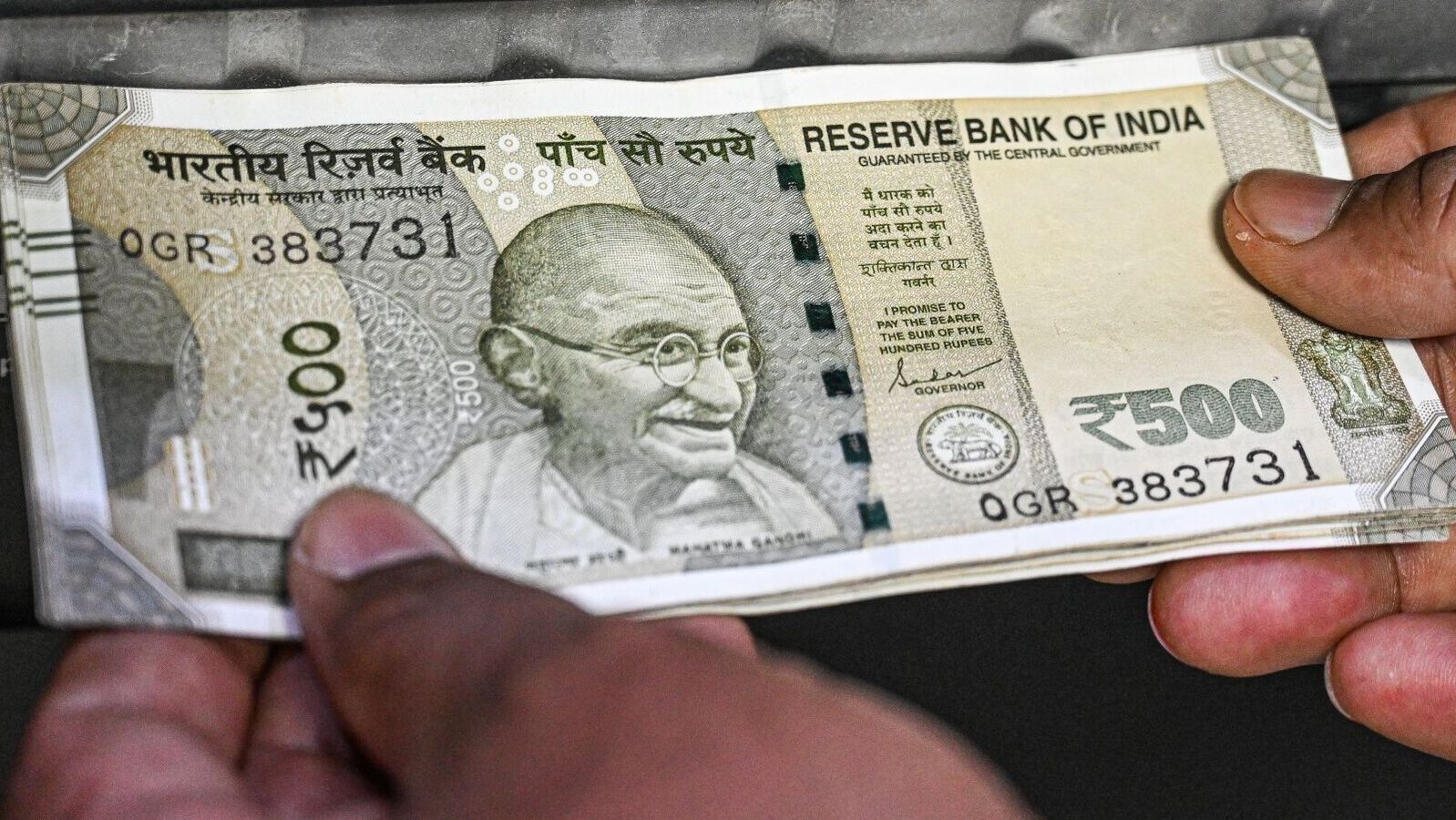 Rupee tops 84/dollar mark for first time since October; analysts abandon bearish outlook