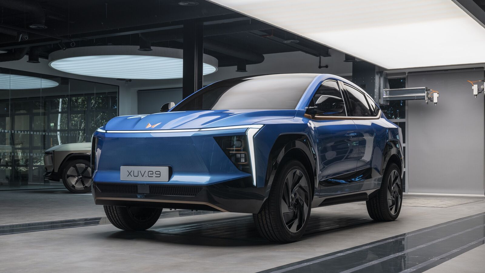 M&M Q4 results: Standalone net profit up 22% to  ₹2,437 crore, revenue rises 24% YoY; declares dividend of  ₹25.3 | Stock Market News