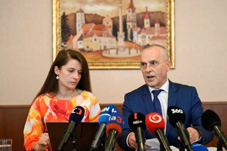 Ondrej Mularcik and Eva Sihelnikova, lawyers of Peter Kazimir