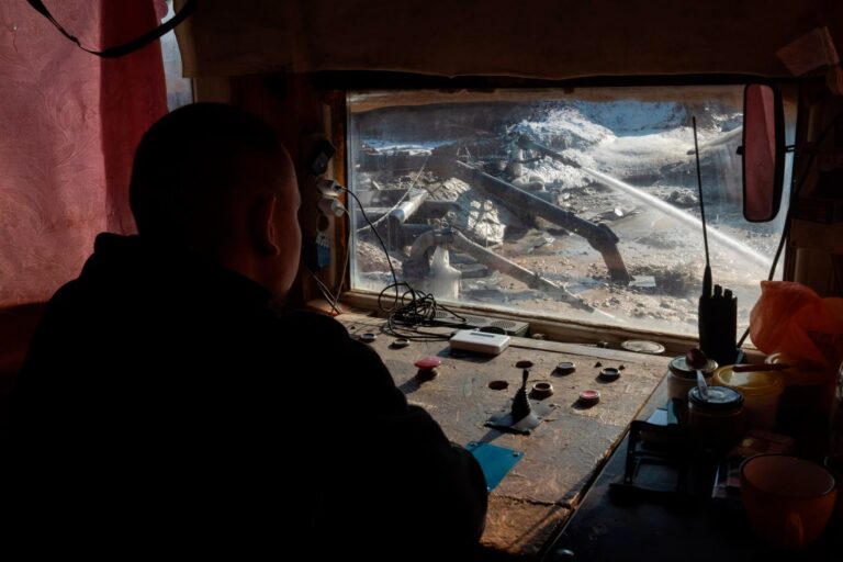 A worker controls extraction of ilmenite, a key element used to produce titanium, in an open pit mine in the central region of Kirovohrad, Ukraine,