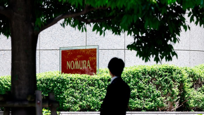 Nomura hails progress in weaning staff off smoking