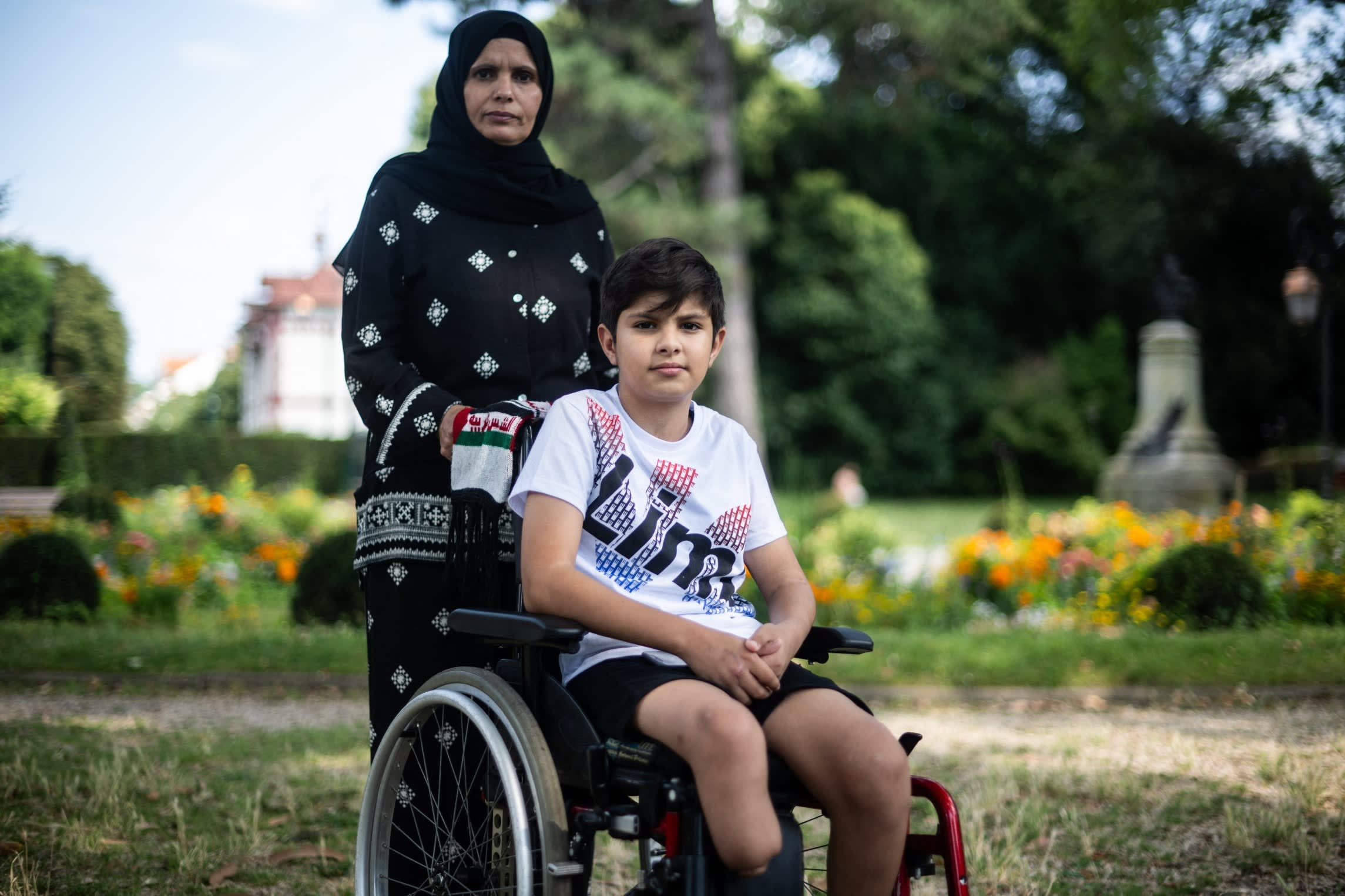 Raja Abdulkareem Abu Mhadi, a Palestinian from Gaza, was allowed to bring her son Asef, 12, to France for treatment after a bombardment left part of his leg requiring amputation.