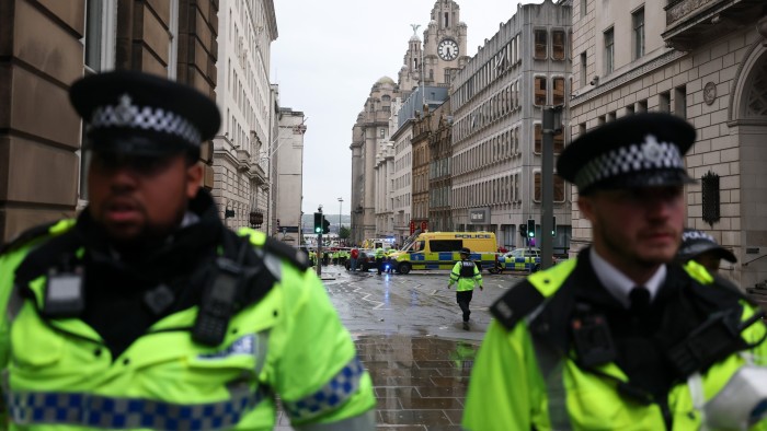 Police arrest man after car hits pedestrians at Liverpool Football Club parade