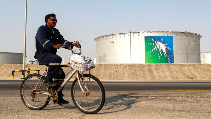 Saudi Aramco cuts its dividend by $10bn
