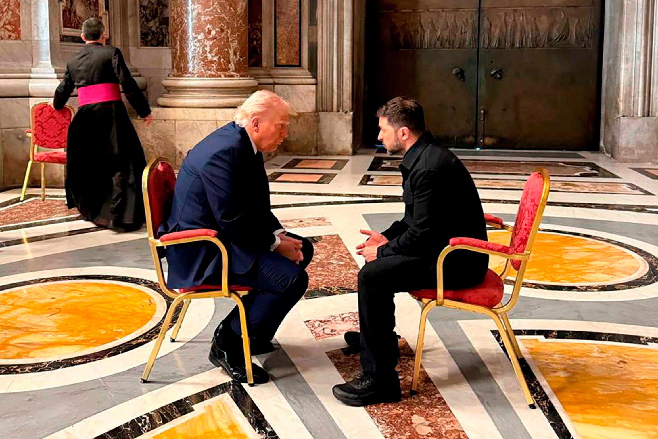 Donald Trump and Volodymyr Zelenskyy talk in St Peter’s Basilica in the Vatican City on April 26 2025 when they attended the funeral of Pope Francis