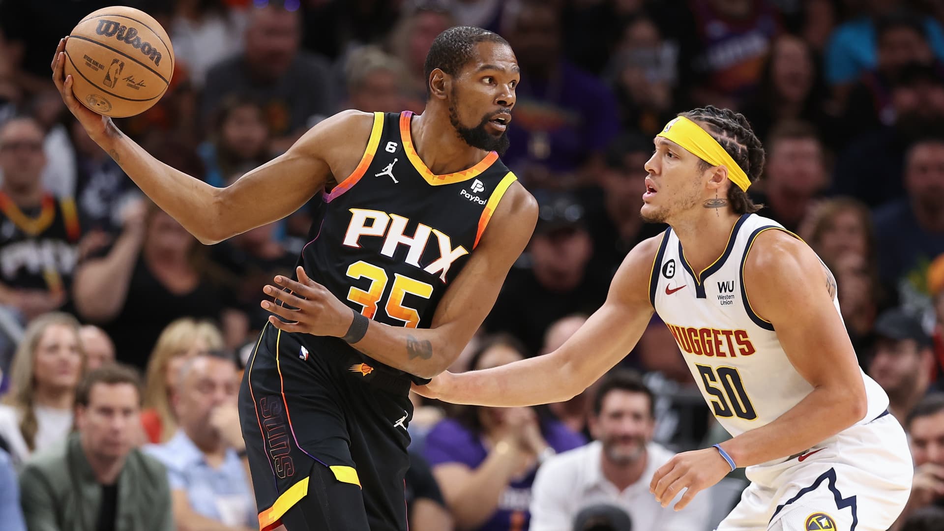 Kevin Durant is going from the Suns to the Rockets in a blockbuster trade, AP source says