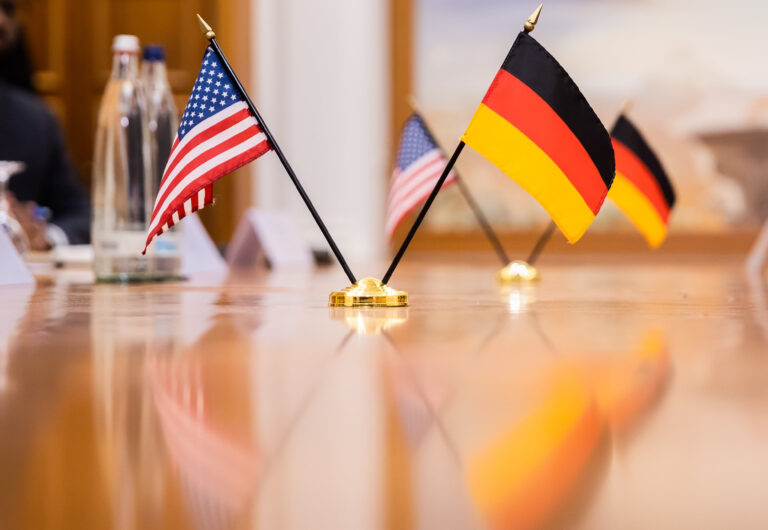 The flags of the U.S. and Germany are on the table at a bilateral meeting between German Economics Minister Habeck and U.S. Secretary of State Blinken at a hotel on the Gendarmenmarkt. Photo: Christoph Soeder/dpa (Photo by Christoph Soeder/picture alliance via Getty Images)