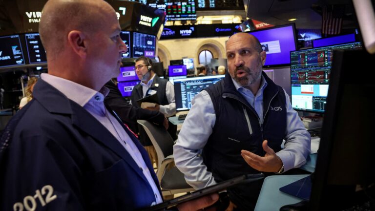Stock futures slip, but major averages head for winning week: Live updates