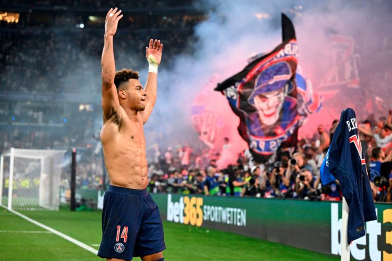 PSG’s Desire Doue celebrates after he scored the third goal