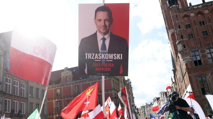 Pro-EU candidate takes narrow lead in Polish presidential election, exit poll says