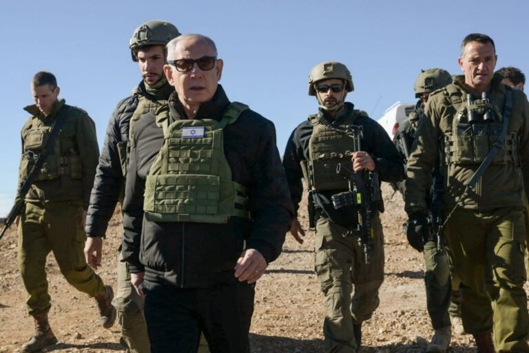 Israeli Prime Minister Benjamin Netanyahu assesses the military situation on Mount Hermon with IDF commanders