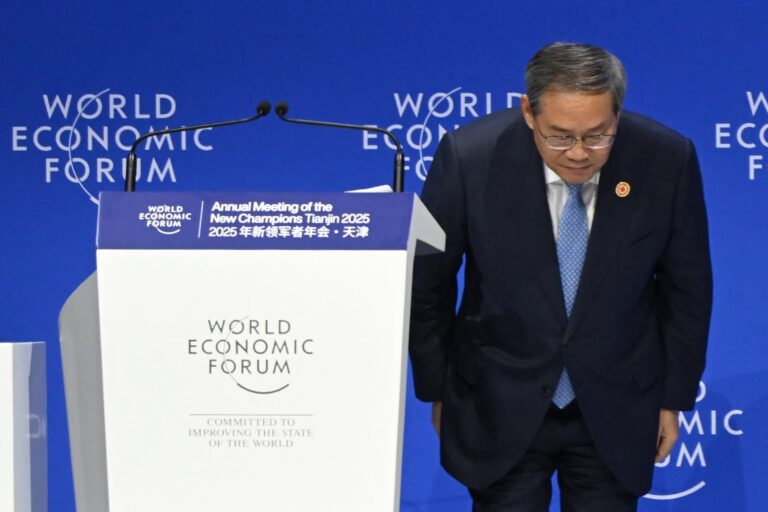 Chian’s premier Li Qiang bows after addressing the World Economic Forum’s ‘Summer Davos’ summit in Tianjin on Wednesday
