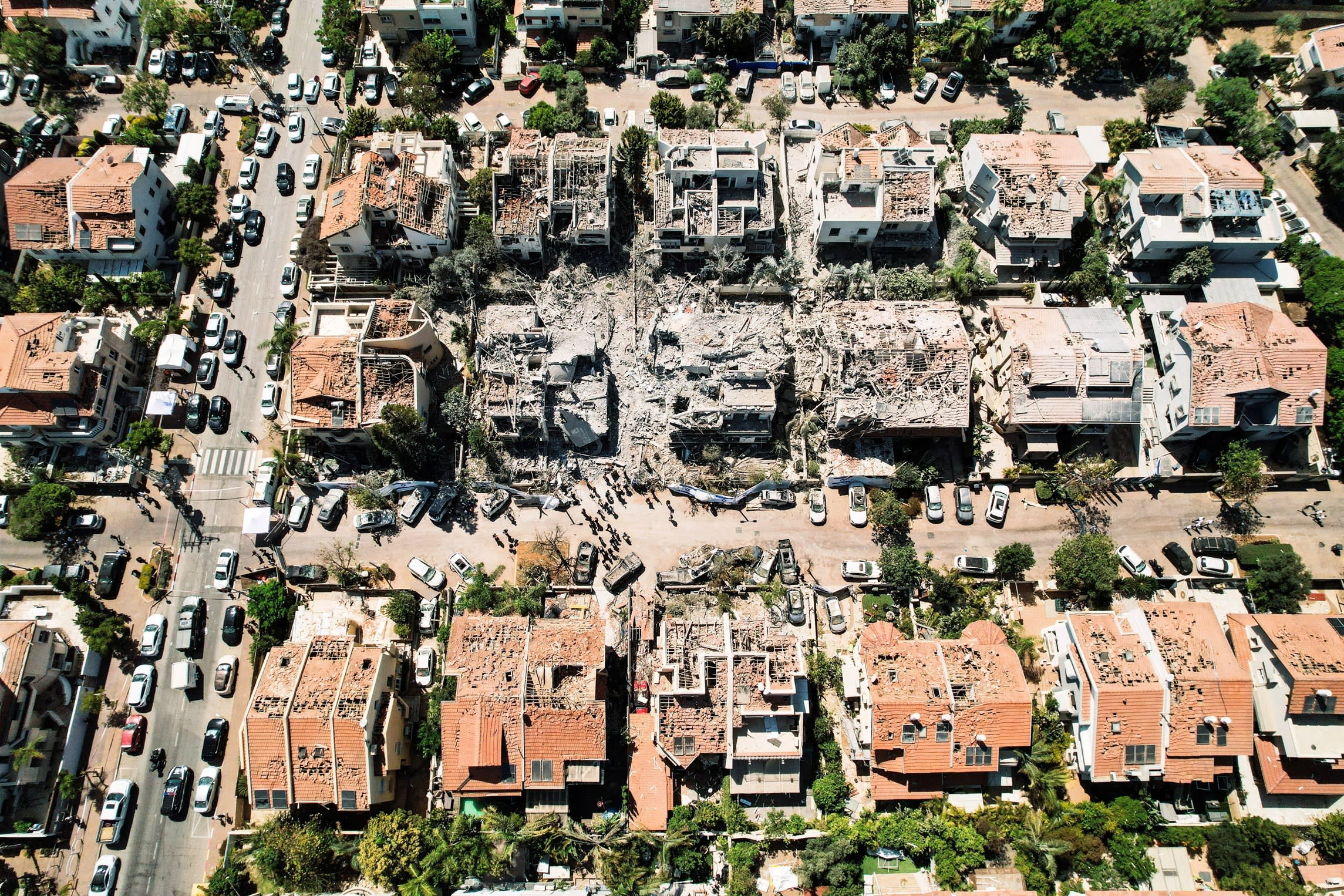 A drone photo shows the damage over residential homes