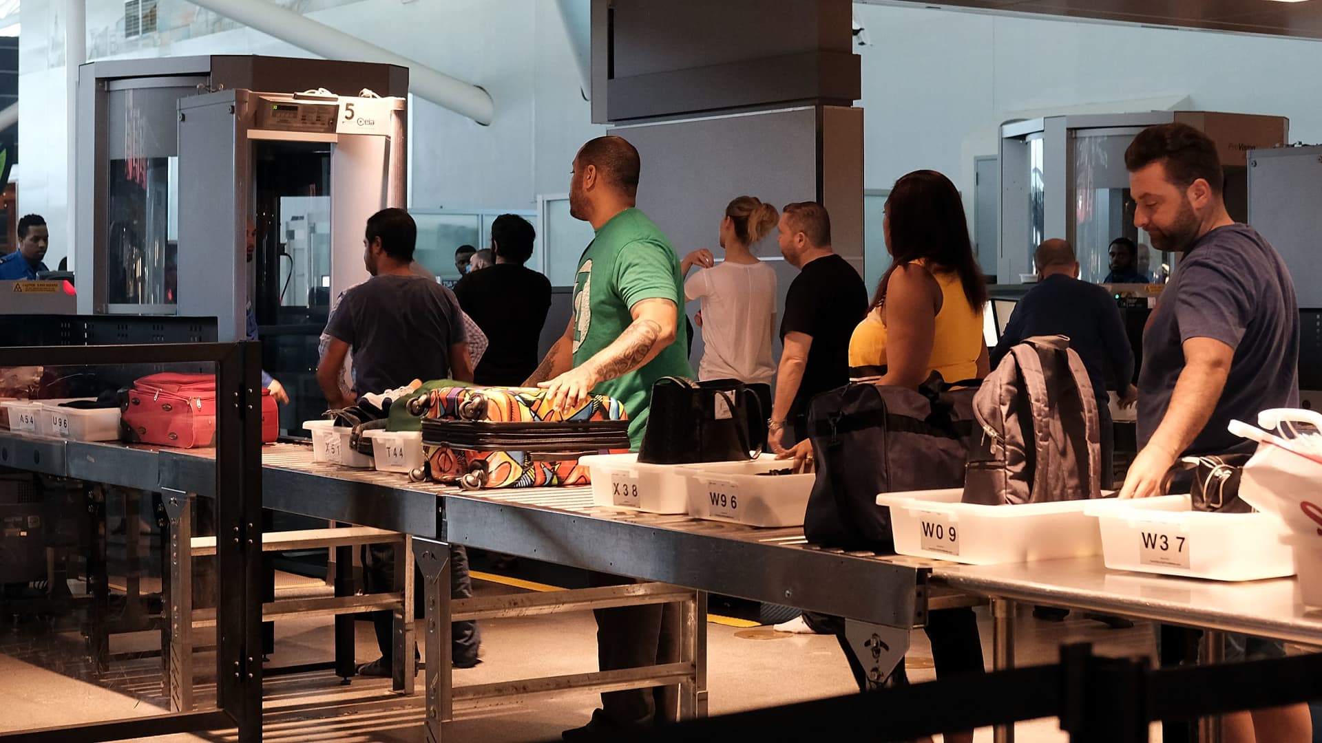 First the shoes went back on. Now, at U.S. airport security, more liquid in carry-ons may be at hand