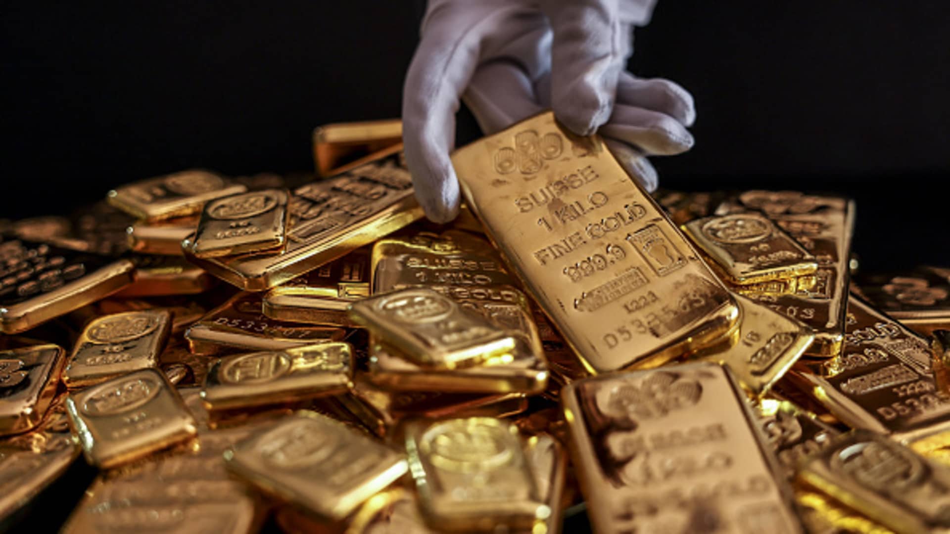 How wealthy investors bet on gold, from buying fractions of a bar to stashing bullions in Swiss military bunkers-turned-vaults
