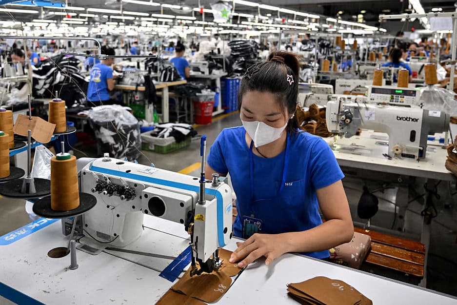 A worker stitches apparels at a garment factory in Vietnam's Thai Nguyen Province on July 2, 2025.