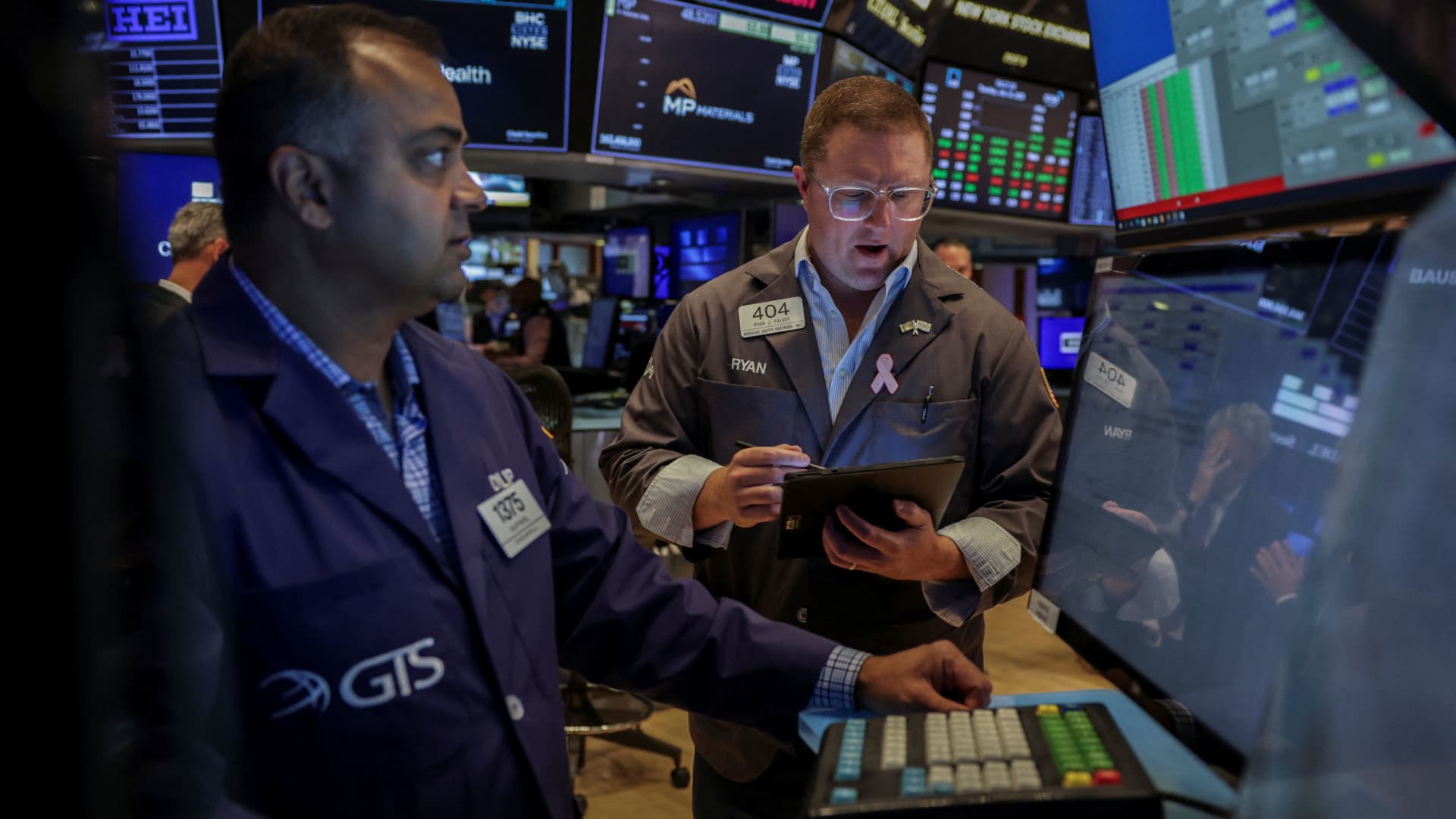 Stock futures are little changed as traders await big tech earnings, eye trade developments: Live updates