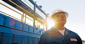 Exxon expects $1.5 billion earnings drop from lower oil, gas prices