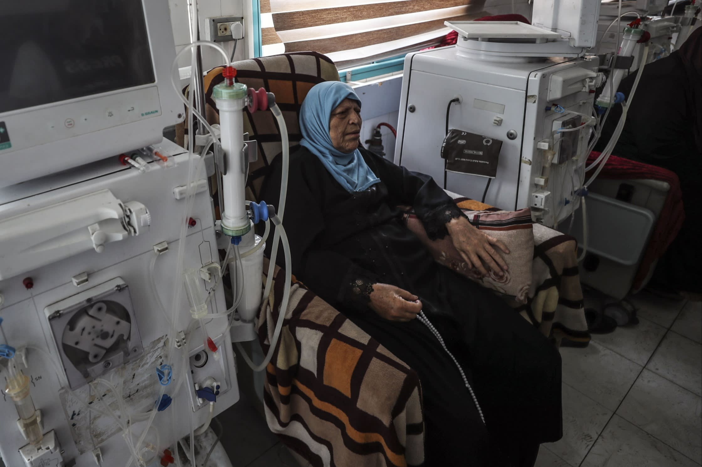 A patient is seen at Al-Shifa Hospital, where the kidney diseases department has become non-operational