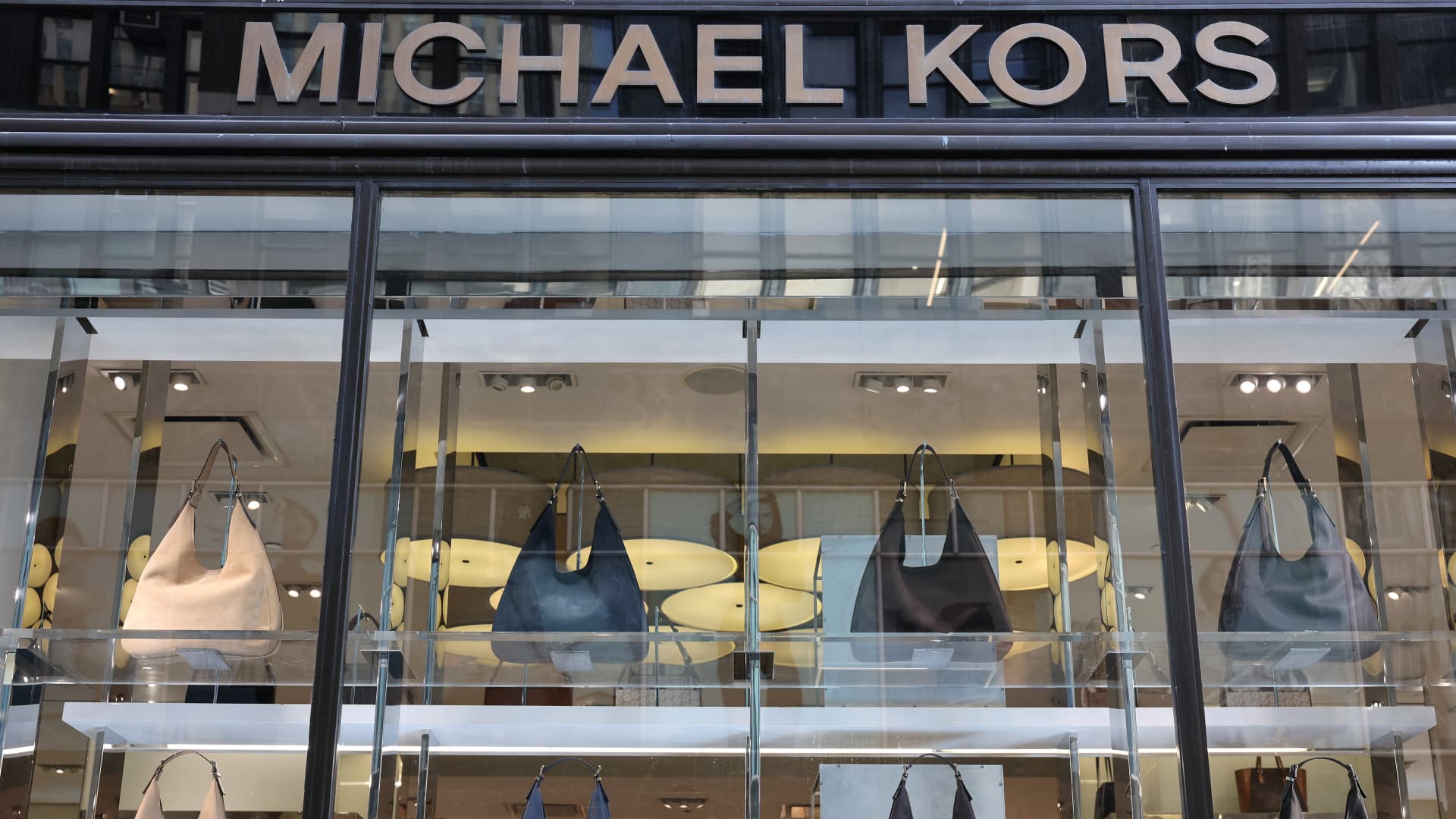 Michael Kors owner Capri forecasts upbeat revenue as luxury demand improves
