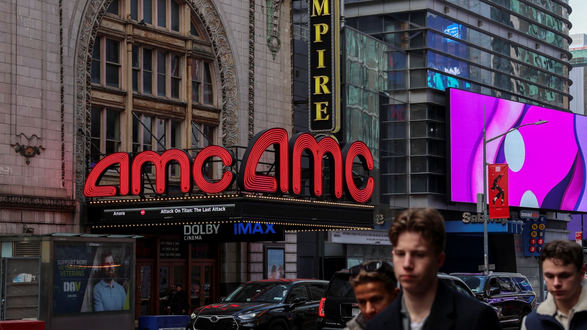 AMC shares surge as movie theater chain narrows losses