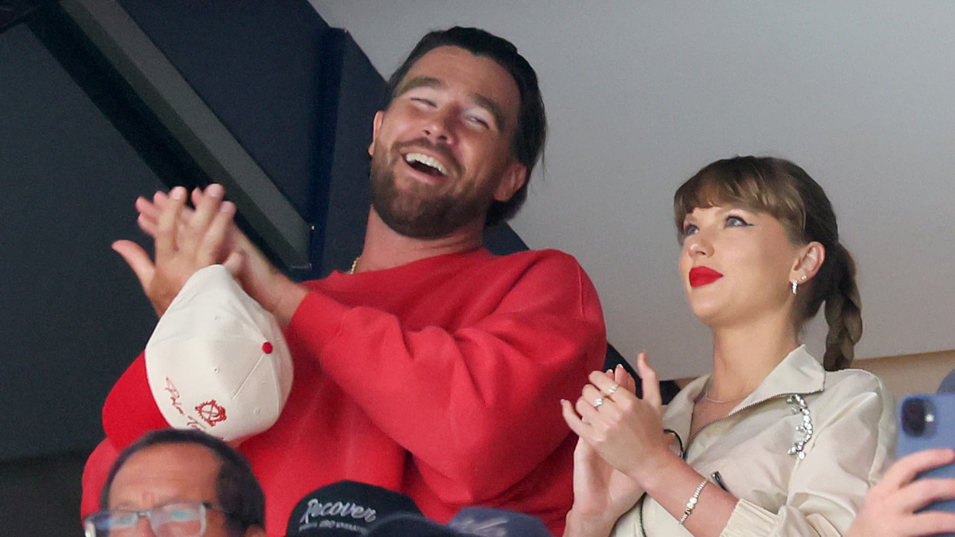 Taylor Swift and Travis Kelce wearing Ralph Lauren in engagement photo could prove positive catalyst for stock, Jefferies says