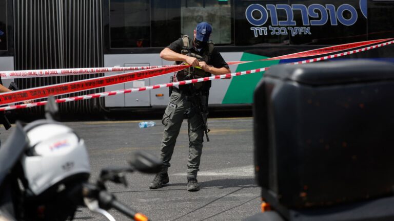 Gunmen kill five at Jerusalem bus stop