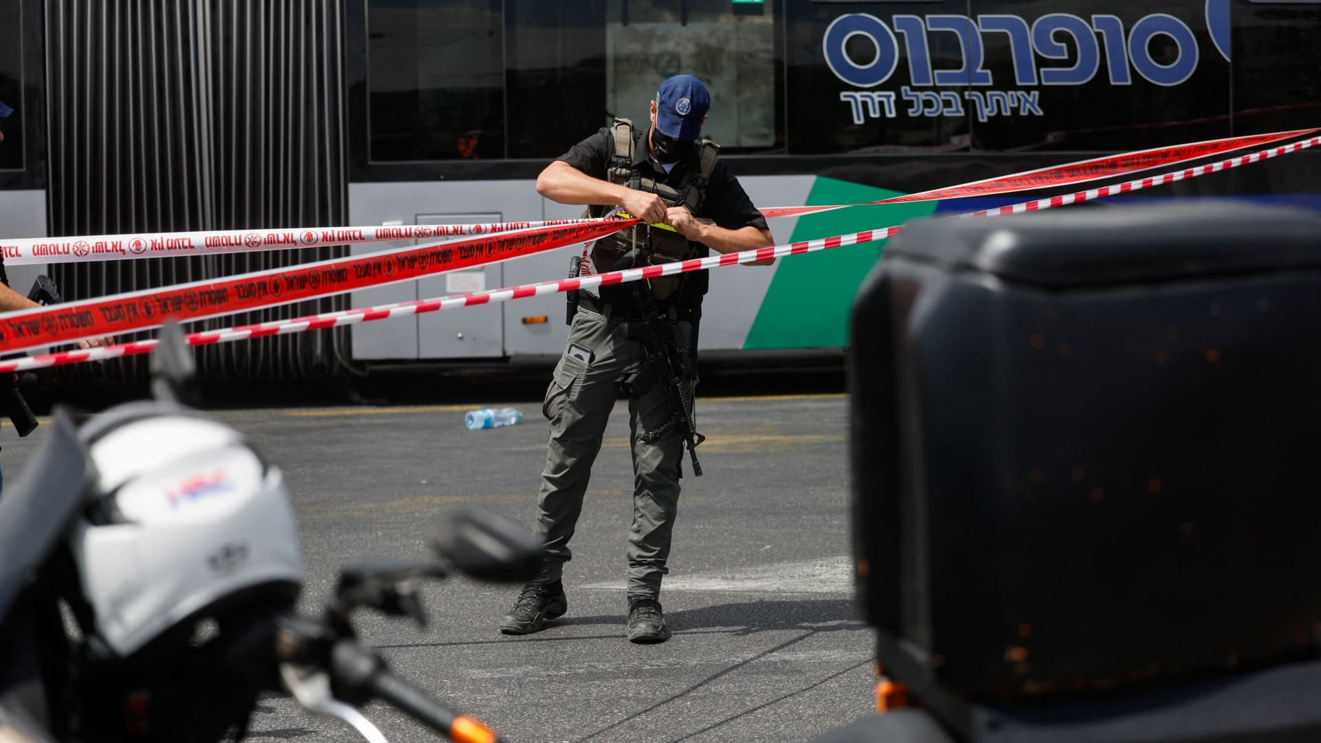 Gunmen kill five at Jerusalem bus stop