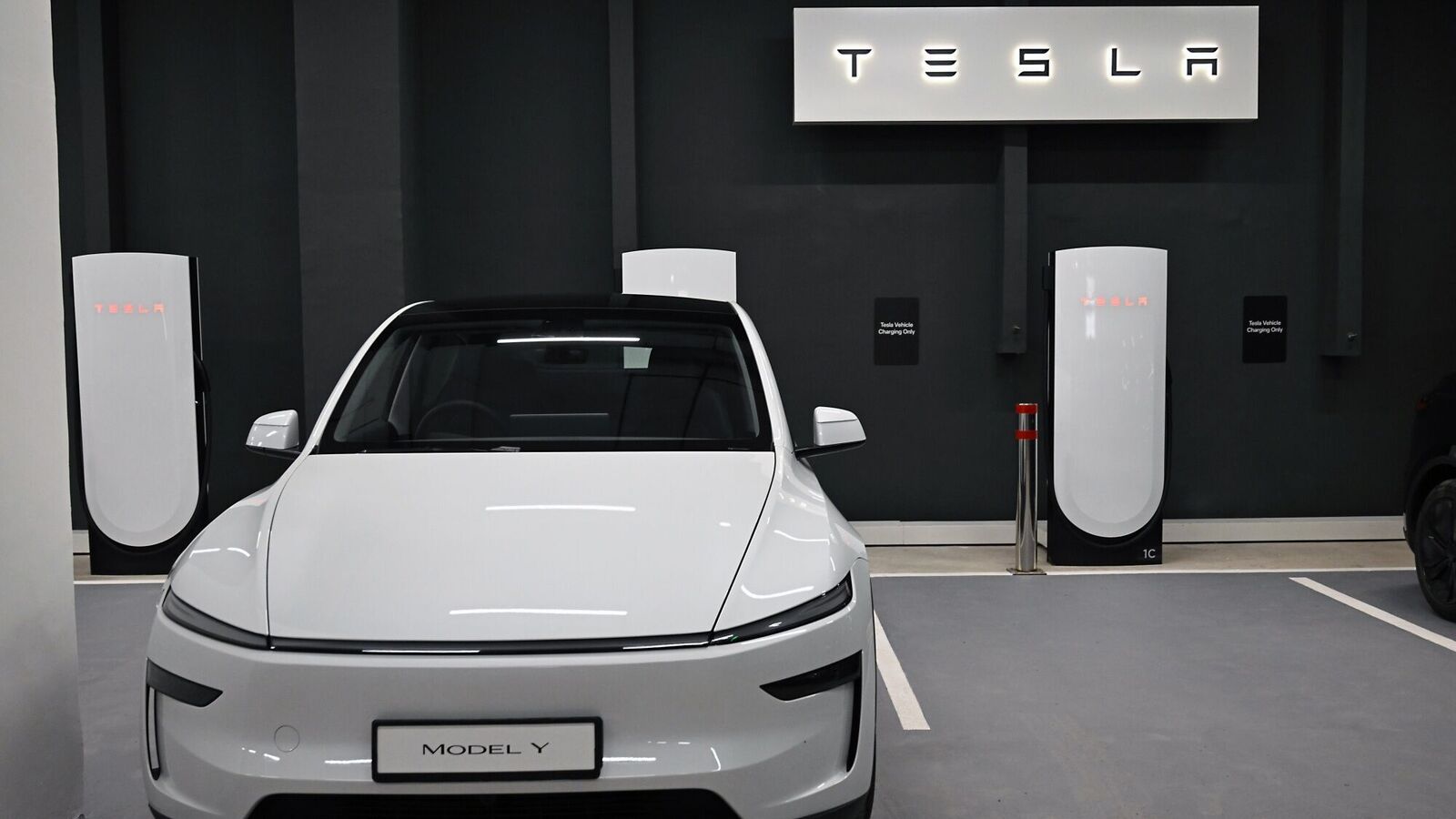 Tesla's share price surges 60% in a year despite market share falling to lowest since 2017. Time to buy, sell or hold?