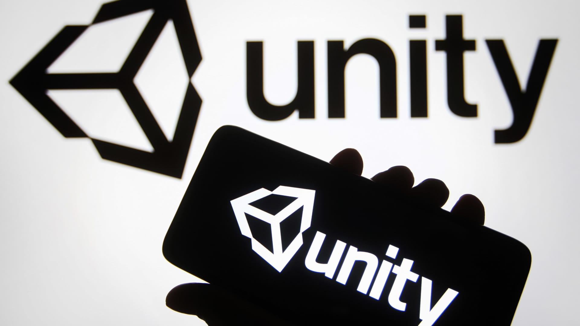 Stocks making the biggest moves midday: Unity Software, Rivian, Pinterest, Trex & more